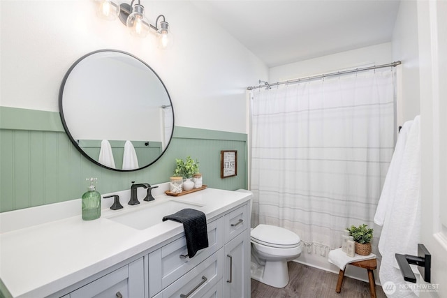 7117 Axis St SE, Lacey, WA 98513 - bathroom featuring vanity, wood finished floors, wainscoting, and a shower with shower curtain