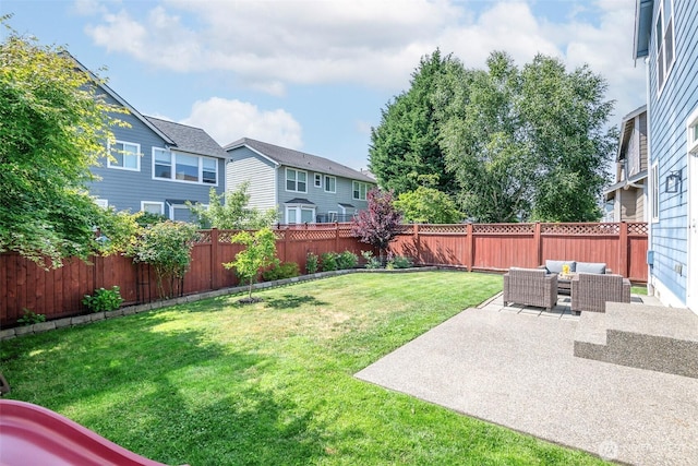 7117 Axis St SE, Lacey, WA 98513 - fenced backyard featuring an outdoor hangout area, a patio, and a residential view