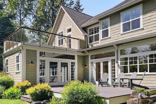 301 Weaver Rd NW, Bainbridge Island, WA 98110 - back of house featuring french doors, a balcony, and roof with shingles