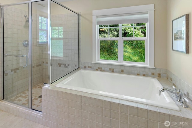 301 Weaver Rd NW, Bainbridge Island, WA 98110 - bathroom with healthy amount of natural light, a stall shower, and a bath