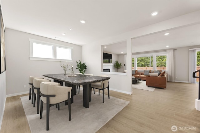 10532 135th Ave NE Unit 32, Kirkland, WA 98033 - dining space featuring recessed lighting, light wood finished floors, and baseboards