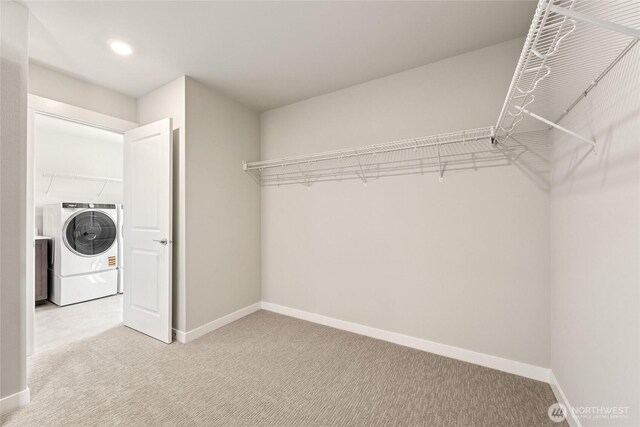 10532 135th Ave NE Unit 32, Kirkland, WA 98033 - walk in closet featuring washer / clothes dryer and carpet flooring