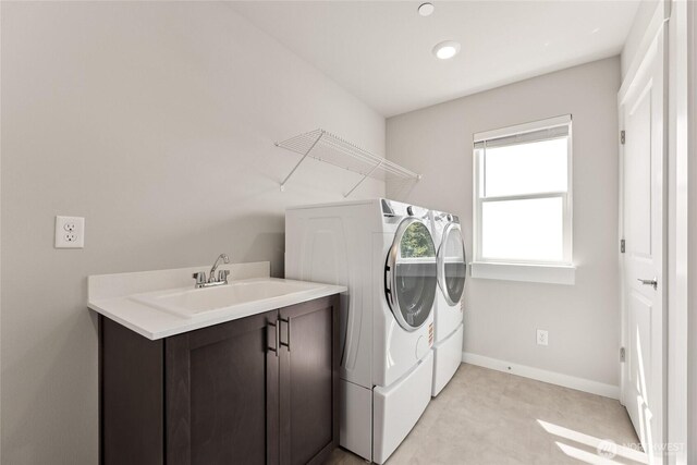 10532 135th Ave NE Unit 32, Kirkland, WA 98033 - laundry area with separate washer and dryer, a sink, baseboards, light colored carpet, and recessed lighting