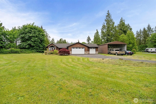 23405 Jordan Rd, Arlington, WA 98223 - view of front of house with asphalt driveway, a front yard, stone siding, and an attached garage