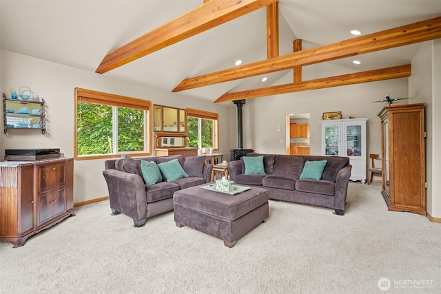 23405 Jordan Rd, Arlington, WA 98223 - living area with recessed lighting, light colored carpet, a wood stove, beamed ceiling, and baseboards