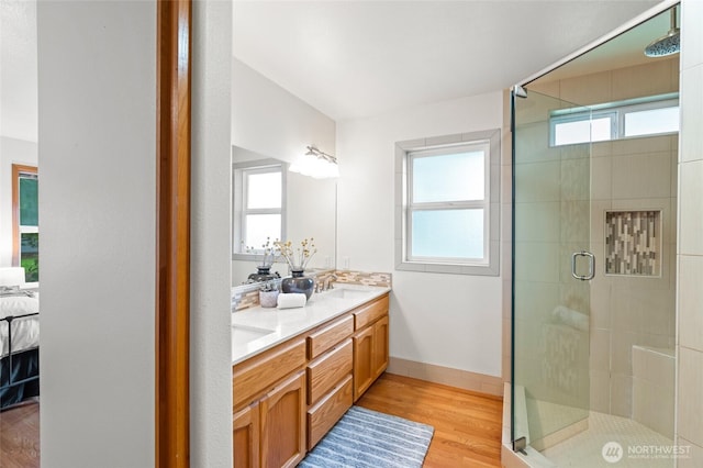 4239 Northridge Way, Bellingham, WA 98226 - bathroom with ensuite bathroom, double vanity, wood finished floors, and a stall shower
