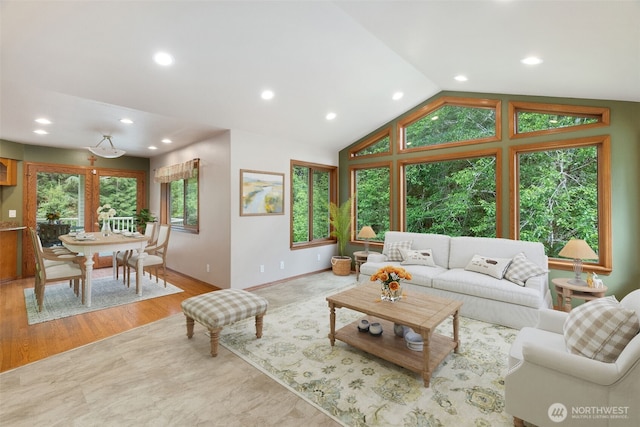 434 N 8th St, Montesano, WA 98563 - living room featuring recessed lighting, vaulted ceiling, and baseboards