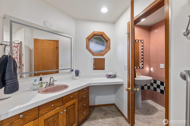 434 N 8th St, Montesano, WA 98563 - bathroom featuring a sink and baseboards