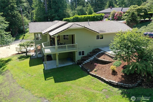 434 N 8th St, Montesano, WA 98563 - rear view of house featuring a patio, stairs, a lawn, and a deck