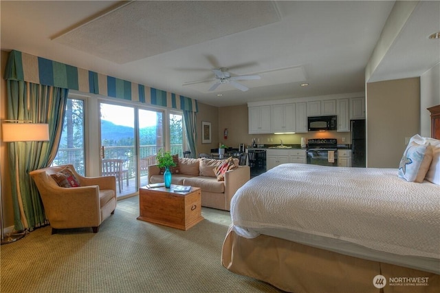1917 Rosario Rd Unit 2104, Orcas Island, WA 98245 - bedroom with freestanding refrigerator, light carpet, and a ceiling fan