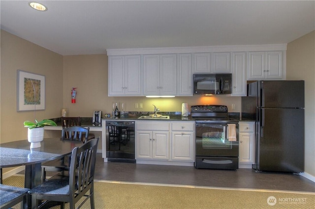 1917 Rosario Rd Unit 2104, Orcas Island, WA 98245 - kitchen featuring black appliances, white cabinetry, and dark countertops