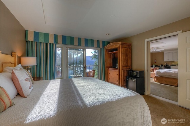 1917 Rosario Rd Unit 2104, Orcas Island, WA 98245 - bedroom featuring light carpet and access to exterior