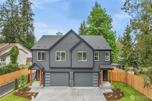 2617 Spruce Rd Unit A, Lake Stevens, WA 98258 - modern home with a garage, concrete driveway, roof with shingles, and board and batten siding