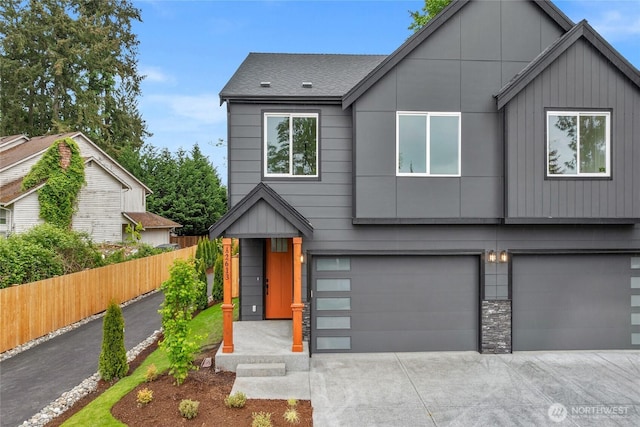 2617 Spruce Rd Unit A, Lake Stevens, WA 98258 - modern home with an attached garage, concrete driveway, and board and batten siding