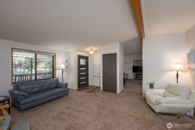 18226 Road B NW, Ephrata, WA 98823 - carpeted living room featuring beam ceiling and baseboards