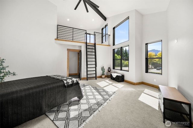 141 Pebble Beach Dr, Cle Elum, WA 98922 - bedroom featuring high vaulted ceiling, carpet flooring, and baseboards