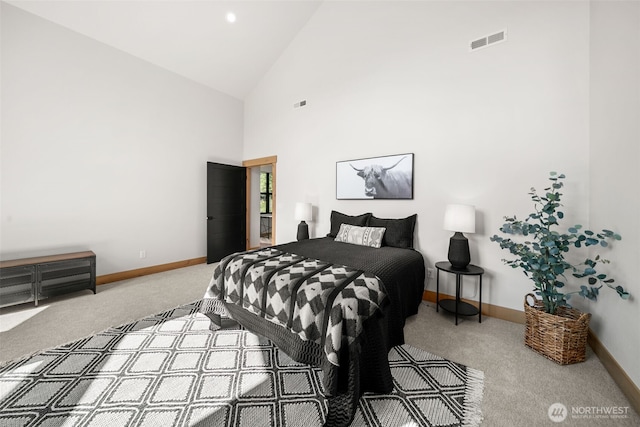 141 Pebble Beach Dr, Cle Elum, WA 98922 - carpeted bedroom with baseboards and high vaulted ceiling