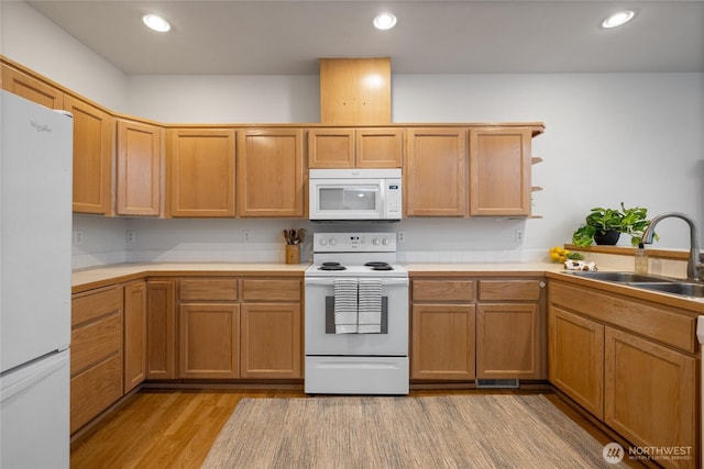 14126 95th Ave NW, Gig Harbor, WA 98329 - kitchen with white appliances, a sink, light wood-style floors, light countertops, and recessed lighting