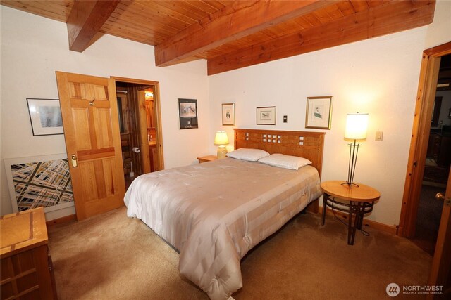 215 Marine Dr, Blakely Island, WA 98222 - bedroom featuring carpet floors, wooden ceiling with exposed beams, and baseboards