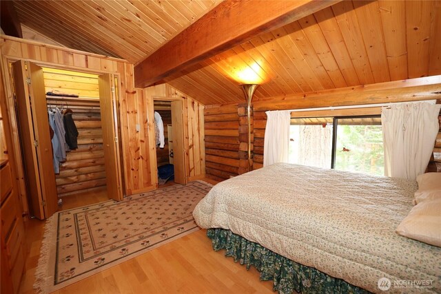 215 Marine Dr, Blakely Island, WA 98222 - bedroom with rustic walls, wood ceiling, wood finished floors, and a closet