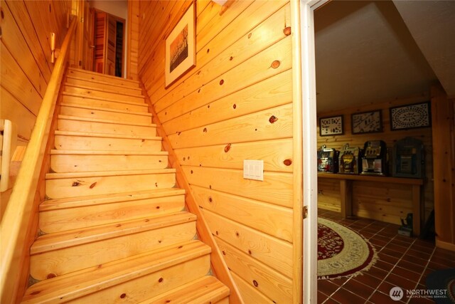 215 Marine Dr, Blakely Island, WA 98222 - stairs with tile patterned floors and wood walls