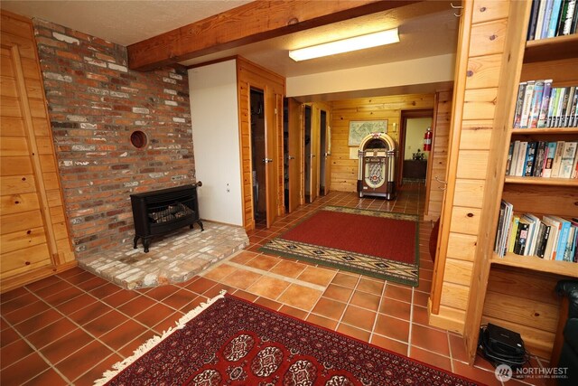 215 Marine Dr, Blakely Island, WA 98222 - hallway featuring wooden walls, tile patterned floors, and beamed ceiling