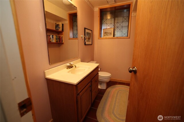 215 Marine Dr, Blakely Island, WA 98222 - half bath with vanity, toilet, tile patterned flooring, and baseboards