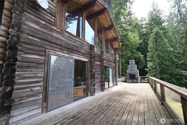 215 Marine Dr, Blakely Island, WA 98222 - deck with an outdoor stone fireplace