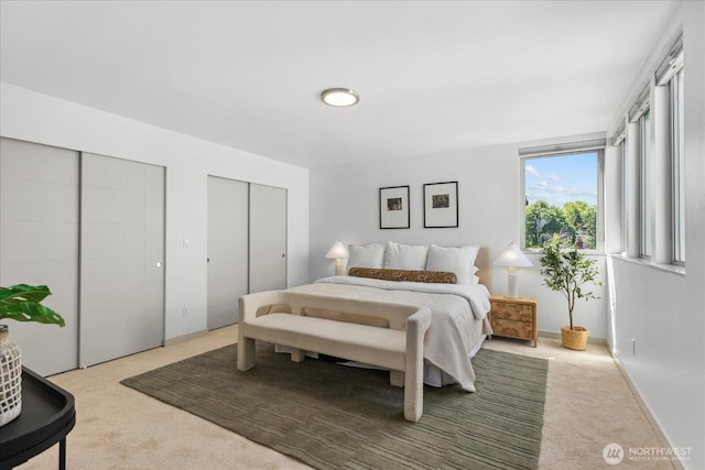 8838 Interlake Ave N, Seattle, WA 98103 - bedroom with carpet floors and two closets