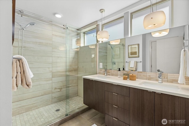 8838 Interlake Ave N, Seattle, WA 98103 - full bath featuring a shower stall, tasteful backsplash, double vanity, and tile patterned flooring