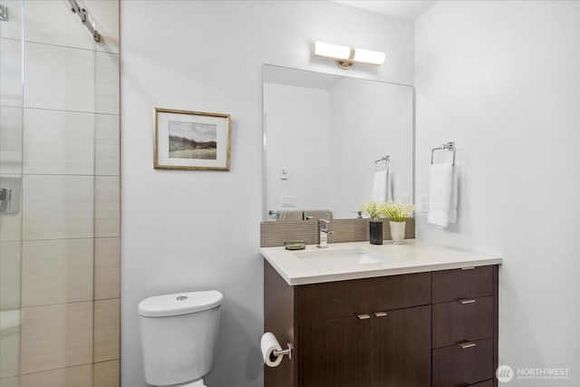 8838 Interlake Ave N, Seattle, WA 98103 - bathroom featuring vanity, toilet, and tiled shower