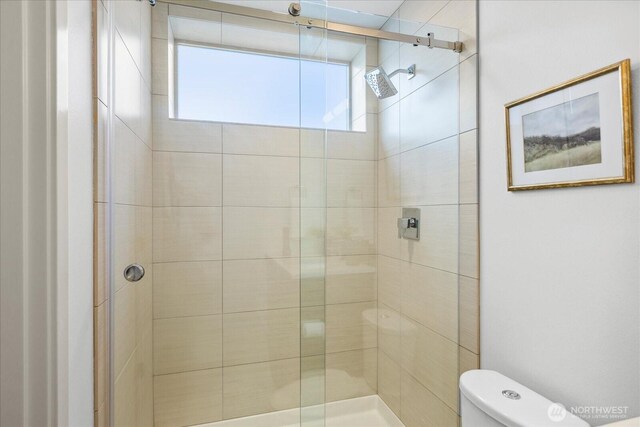 8838 Interlake Ave N, Seattle, WA 98103 - bathroom with toilet and a shower stall