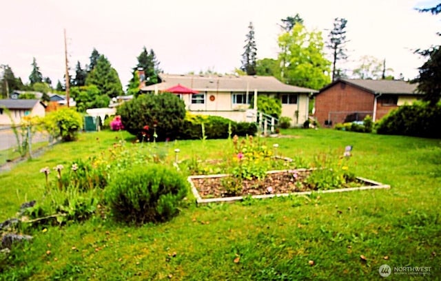 31405 10th Ave S, Federal Way, WA 98003 - view of yard featuring a vegetable garden