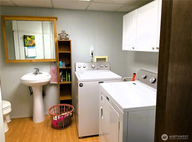 31405 10th Ave S, Federal Way, WA 98003 - laundry room featuring independent washer and dryer and light wood-style floors