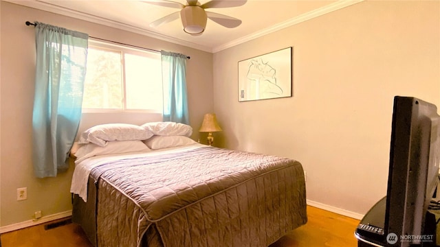 31405 10th Ave S, Federal Way, WA 98003 - bedroom featuring baseboards, wood finished floors, ornamental molding, and a ceiling fan