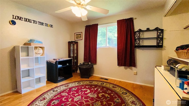 31405 10th Ave S, Federal Way, WA 98003 - office area featuring wood finished floors, a ceiling fan, and baseboards