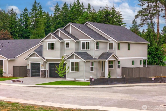 11210 79th Avenue Ct SW, Lakewood, WA 98498 - view of front of home with concrete driveway and an attached garage