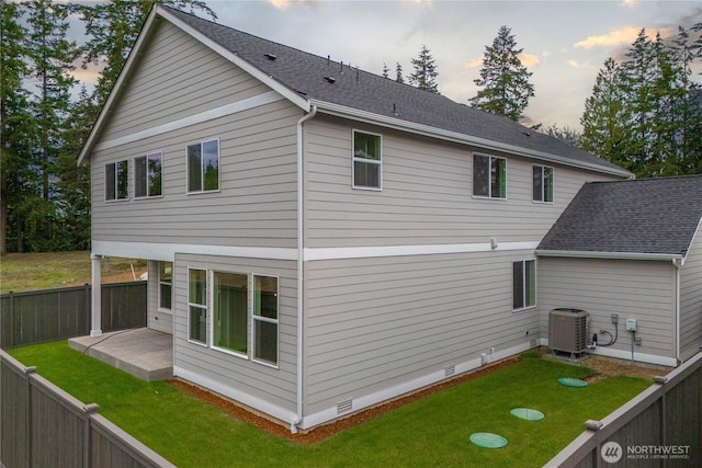 11210 79th Avenue Ct SW, Lakewood, WA 98498 - back of property with central air condition unit, crawl space, a patio, and a shingled roof