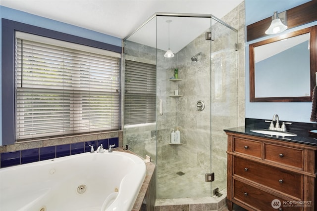 181 N 2nd St, Morton, WA 98356 - full bathroom featuring a whirlpool tub, a stall shower, and vanity