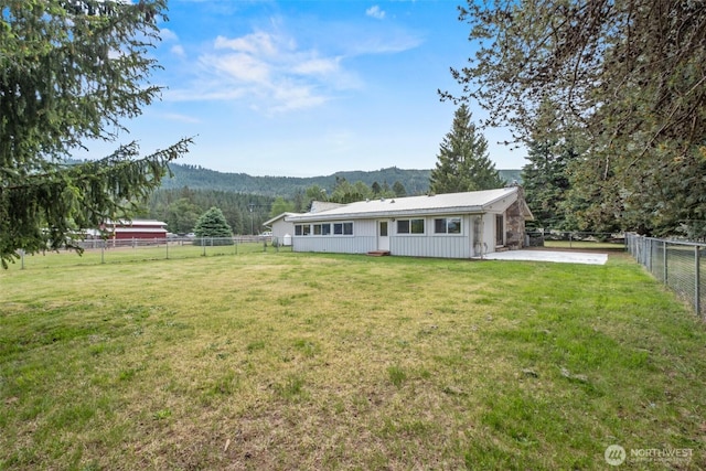 7938 E Leavenworth Rd, Leavenworth, WA 98826 - rear view of property featuring a patio and a mountain view
