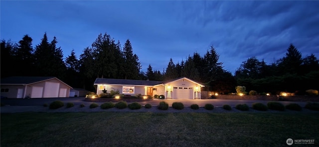 28118 163rd St E, Wilkeson, WA 98396 - ranch-style house with a garage and a lawn