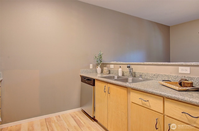 10800 SE 17th Cir Unit D50, Vancouver, WA 98664 - kitchen featuring stainless steel dishwasher, light brown cabinets, light countertops, and light wood-style flooring