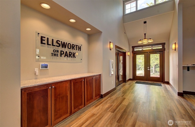10800 SE 17th Cir Unit D50, Vancouver, WA 98664 - entrance foyer featuring french doors, light wood finished floors, recessed lighting, and a high ceiling