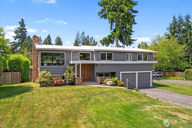 22606 87th Ave W, Edmonds, WA 98026 - raised ranch featuring driveway, a chimney, and an attached garage