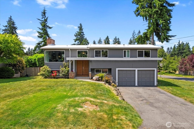 22606 87th Ave W, Edmonds, WA 98026 - bi-level home featuring a garage, asphalt driveway, and a chimney