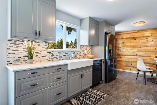22606 87th Ave W, Edmonds, WA 98026 - kitchen with stainless steel fridge with ice dispenser, gray cabinetry, black dishwasher, and wood walls