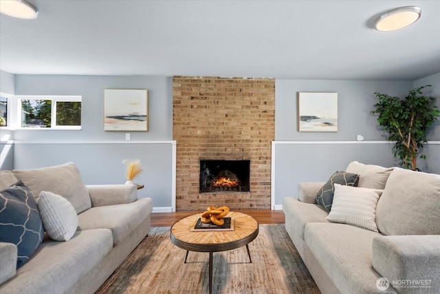 22606 87th Ave W, Edmonds, WA 98026 - living room featuring wood finished floors and a brick fireplace