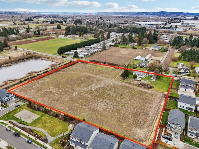 3102 16th Ave NW, Puyallup, WA 98371 - aerial overview of property's location featuring property boundaries highlighted and a nearby body of water