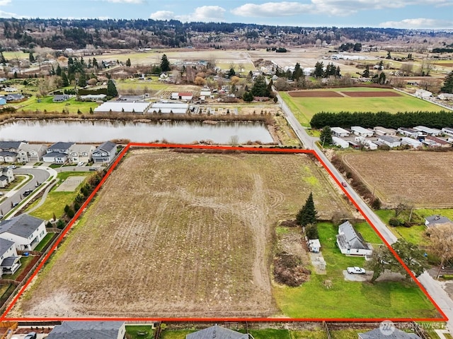 3102 16th Ave NW, Puyallup, WA 98371 - overview of rural landscape with property boundaries highlighted and a large body of water