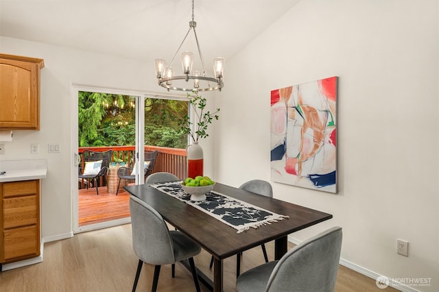 3816 NE 110th St, Seattle, WA 98125 - dining space featuring light wood finished floors and a chandelier